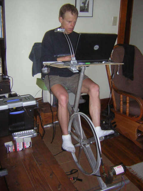 photo of me working on my laptop on early prototype desk