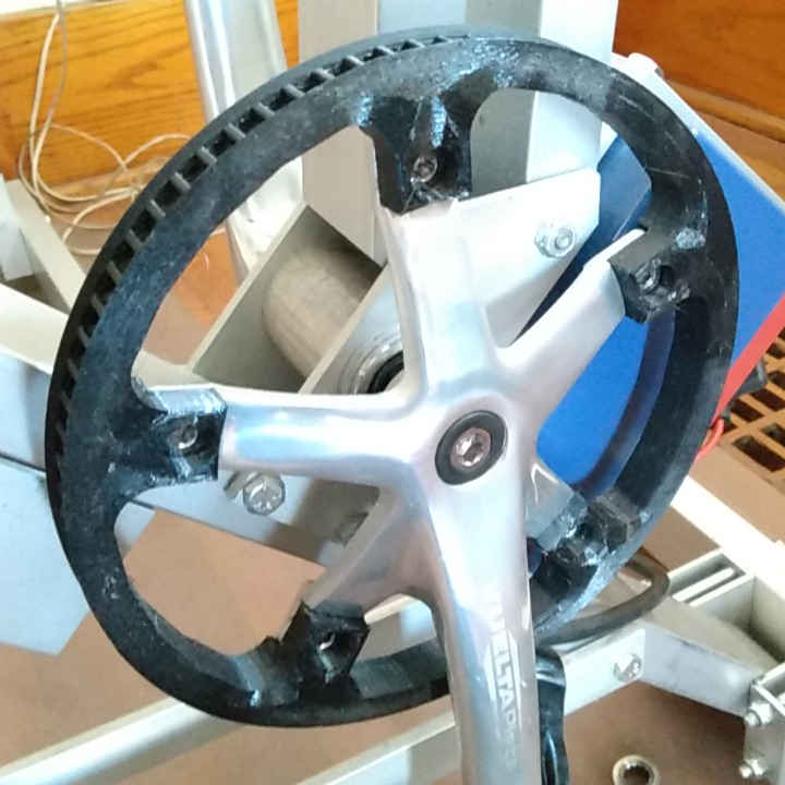 toothed pulley mounted on crankarm on the generator